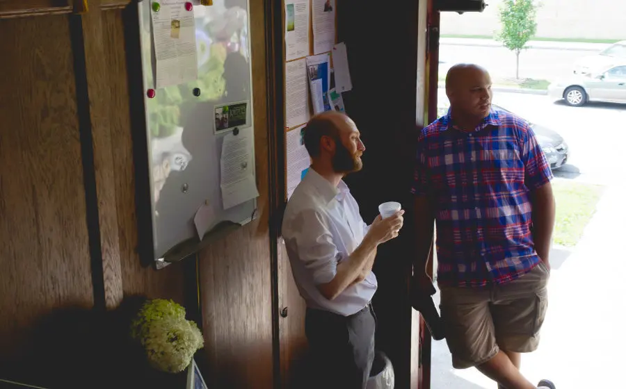 Members chatting in the church entryway